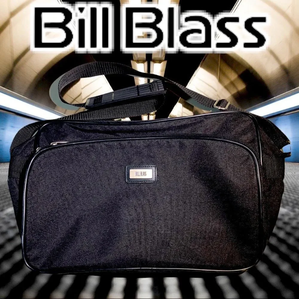 Bill Blass Small Carry On Small Luggage Bag from a larger Set.